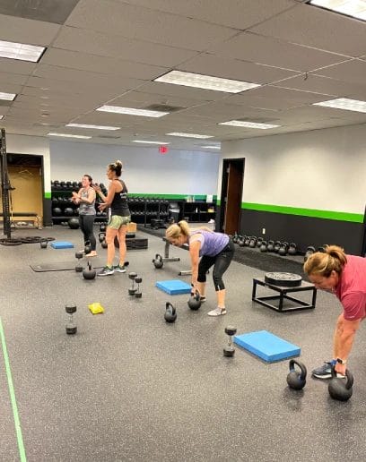 Women working out on group training